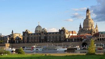 ships ol elbe river in view of frauenkirche, germany, dresden