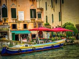colorful boat on canal grande, italy, venice