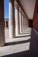 row of doric stone carved columns