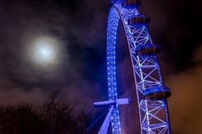 london eye, purple ferris wheel at dark night sky, uk, england