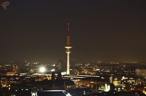 tv tower in night cityscape, germany, hamburg