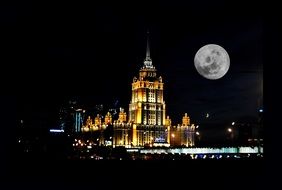 full moon above night city, russia, moscow