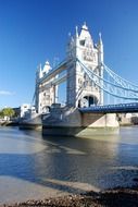 tower bridge across thames river at sunny day, uk, england, london water