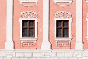 old dusky pink painted facade with grated windows, germany, Wasserburg am Inn