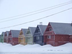 new colorful houses in snow, norway