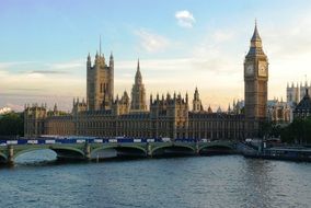 parliament building and thames river at evening, england, london