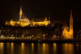 castle on danube river at night, hungary, budapest