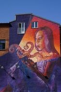 Colorful graffiti on a building wall