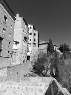 old city on mountain side, black and white, spain