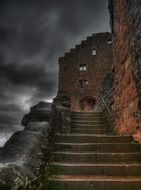 stairway of old ruined castle at cloudy sky, germany