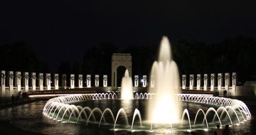 fountains at the WWII memorial at night