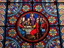 color glass window last supper church