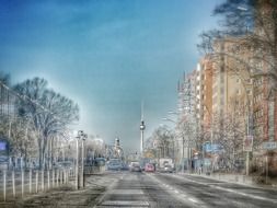 distant tv tower in perspective of street, germany, berlin