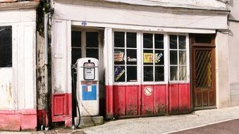 vintage oil pump in village, france, burgundy, nièvre