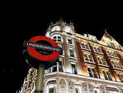 underground street sign at night, uk, england, london, knightsbridge