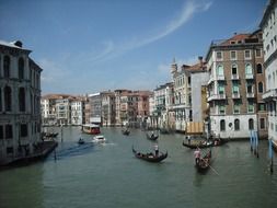 people in gondolas and boats on channel, italy, venice