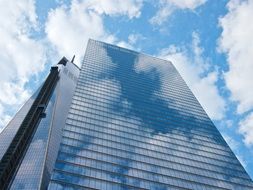 skyscraper with external elevator at sky