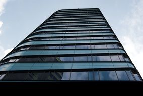 bottom view of on the high glass skyscraper