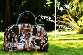 Bag on travel background sign