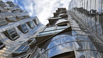 mirroring facade of Neuer Zollhoff building of Frank Gehry, germany, düsseldorf