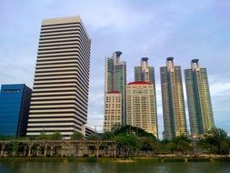new office buildings and apartments at water in thailand, bangkok