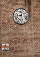 antique clock on red brick wall, spain, madrid