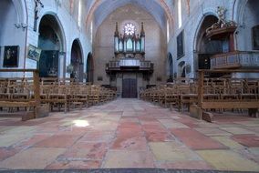 wide angle view of medieval church interior, france