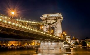 chain bridge above water at night, hungary, budapest