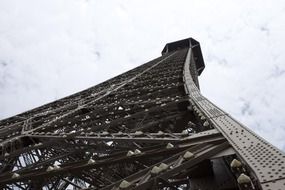 Sky touching Eiffel Tower, bottom view