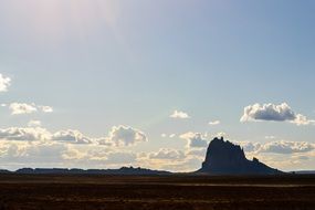 Silhouette of cliff in sunlight