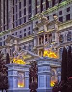 entrance to caesar’s palace at evening, usa, nevada, las vegas