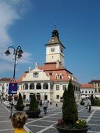 County Museum of History building with clock on tower, romania, brassó
