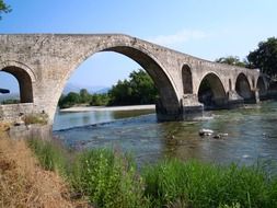ancient bridge across Arachthos river, greece, arta