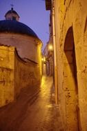 alley in old town at evening, italy, sicily, modica