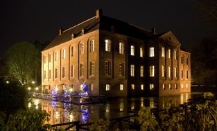 illuminated three-storey building at night