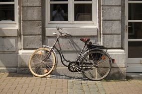 old ladies bike against the wall