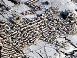 aerial view of old snow covered town, spain