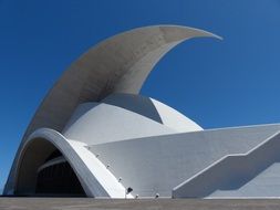 sickle-shaped facade at sky, auditorium of tenerife, spain, canary islands, santa cruz de tenerife