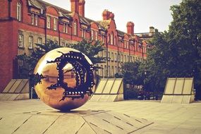 sphere within sphere, modern bronze sculpture at old mansion, uk, ireland, Dublin, Trinity College