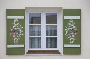 painted flowers on window shutters, peasant art, germany, bavaria