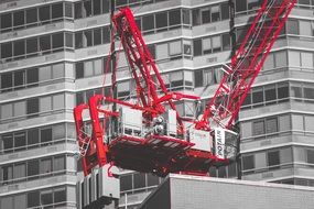 construction red crane black white buildings