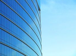 blue facade of modern office building, side view