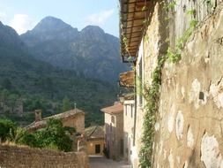 grunge facades of old houses at mountains, spain, mallorca