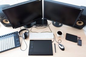 graphics station, computer and digital devices on desk