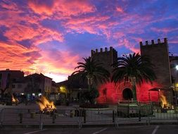 fires on square at town gate, spain, mallorca, alcudia