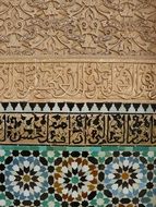 colorful arabic mosaic on wall, morocco