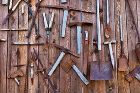 rusty deadman ranch wild west equipment on a wall