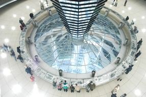 people in interior of reichstag glass Dome, germany, berlin