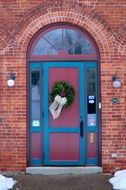 Christmas entrance door red brick building