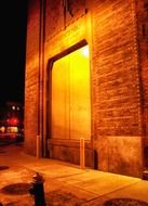 power substation building on sidewalk at night, usa, new york city, brooklyn